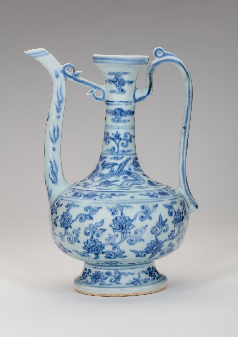 A MING BLUE-AND-WHITE EWER WITH XUANDE MARK 明宣德款青花缠枝莲纹执 